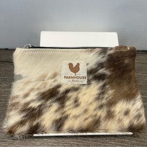 Farmhouse Frocks Fur Pouch.zip closure.genuine cowhide. Pre-owned. Worn area.